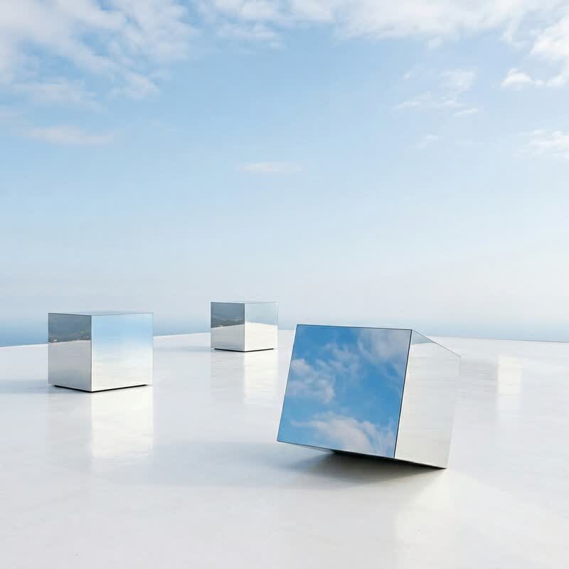 Chrome cubes on a white plane — a clean product-style render