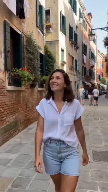 A model wearing a swapped outfit in motion